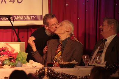 Larry Fuller kisses Stu Hodes